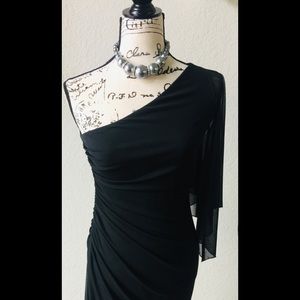 Sexy asymmetrical black chiffon cocktail dress.